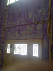 spray foam insulation installed around entry way