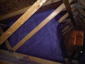 spray foam insulation installed around skylight cavity