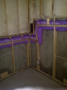 spray foam insulation installed on concrete foundation transition